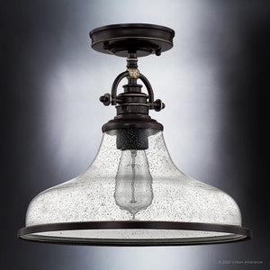 An UQL3668 Traditional Ceiling 12.5''H x 13.5''W Parisian Bronze Finish light fixture with a glass shade by Urban Ambiance, offering a unique and luxury