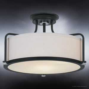 A unique lighting fixture from the Winchester Collection, the UQL3771 features a beautiful Natural Black Finish and a white shade, with dimensions of 10.5''H x 17.