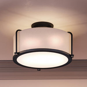 A unique Urban Ambiance lighting fixture with a white shade.