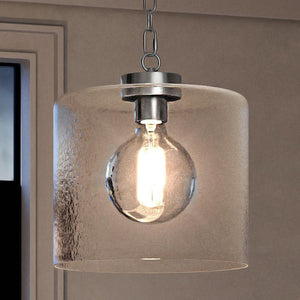 A beautiful Urban Ambiance UQL3792 Modern Farmhouse Pendant 13.25''H x 12''W, Polished Chrome Finish, Bideford Collection lighting fixture hanging over