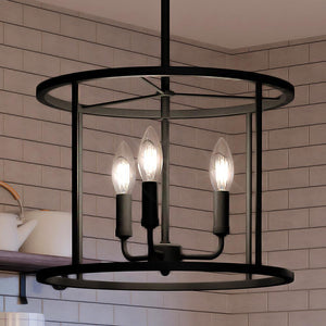 A unique UQL3794 Modern Farmhouse lighting fixture with a gorgeous Matte Black Finish, Bideford Collection, featuring three candles.