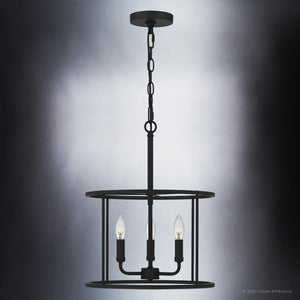 A beautiful UQL3794 Modern Farmhouse Chandelier 18''H x 14''W with a unique Matte Black Finish, Bideford Collection featuring three lights hanging from it.