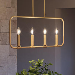 A unique lighting fixture, the UQL3796 Modern Farmhouse Chandelier features an Olde Brass Finish, Bideford Collection by Urban Ambiance with four candles hanging from it.