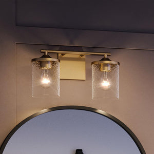 A bathroom with two unique UQL3811 Modern Farmhouse Bath Fixtures 7.75''H x 14''W, Olde Brass Finish, Bideford Collection by Urban Ambiance