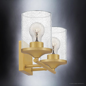 An Urban Ambiance gold lighting fixture with two unique glass jars and a gorgeous light bulb.