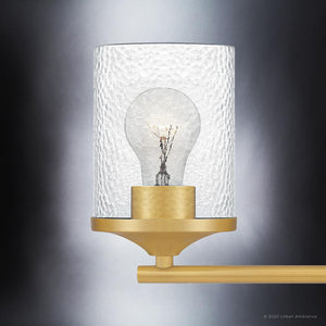 A luxury UQL3811 Modern Farmhouse Bath Fixture 7.75''H x 14''W, Olde Brass Finish, Bideford Collection lighting fixture with a glass bulb