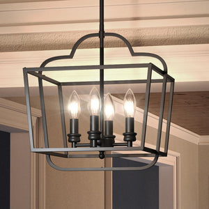 An UQL3822 Classic Chandelier 14.75''H x 14''W, Matte Black Finish, Newquay Collection by Urban Ambiance with four gorgeous lights hanging from the ceiling