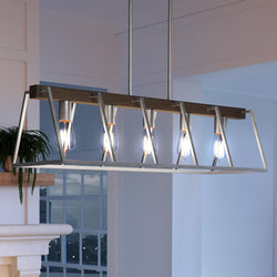 A unique lighting fixture hanging over a fireplace in a beautiful living room.