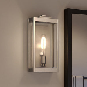 A beautiful Urban Ambiance UQL3842 Cosmopolitan Wall Sconce 15''H x 7''W, Polished Nickel Finish, Penzance Collection with a light