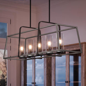 A unique modern farmhouse chandelier with glass shades adds a luxury lighting fixture to the dining room.