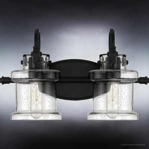 A beautiful Urban Ambiance bathroom light fixture with two unique lights and a luxurious black background.