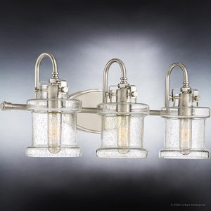 Three unique UQL3981 Modern Farmhouse Bath Fixtures with clear glass shades from the Urban Ambiance Wrexham Collection.
