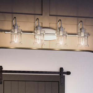 A beautiful Urban Ambiance bathroom lamp fixture with a barn door.