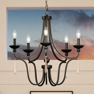 A gorgeous lighting fixture, the Urban Ambiance UQL4071 Traditional Chandelier with Parisian Bronze Finish from the Ayr Collection, illuminates a living room with a view of the sky.