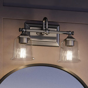 A beautiful Urban Ambiance bathroom vanity with two UQL4114 Traditional Bath Fixtures 10''H x 15''W, Polished Chrome Finish, Edinburgh Collection lights and a mirror