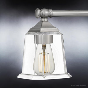 A unique lighting fixture with a clear glass shade.