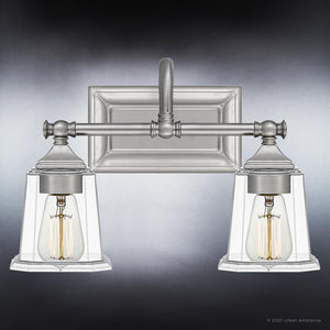 A beautiful Urban Ambiance bathroom lighting fixture with two clear glass shades, the UQL4115 Traditional Bath Fixture 10''H x 15''W, Brushed Nickel Finish, Edinburgh Collection.