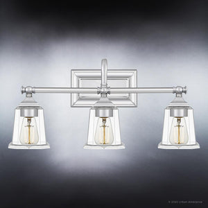 Three UQL4117 Traditional Bath Fixtures with clear glass shades, from the Edinburgh Collection by Urban Ambiance, featuring beautiful designs and gorgeous clear glass shades.