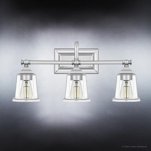 Three beautiful UQL4117 Traditional Bath Fixtures with clear glass shades by Urban Ambiance.
