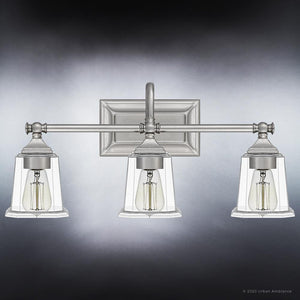 Three gorgeous UQL4118 Traditional Bath Fixtures with clear glass shades.