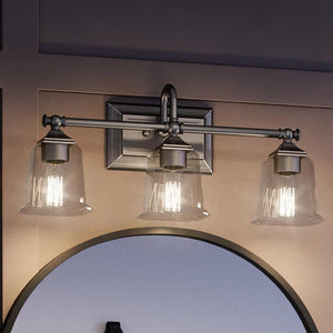 An Urban Ambiance bathroom vanity with three UQL4118 Traditional Bath Fixtures measuring 10''H x 22''W, featuring a Brushed Nickel Finish, from the Edinburgh Collection and accompanied