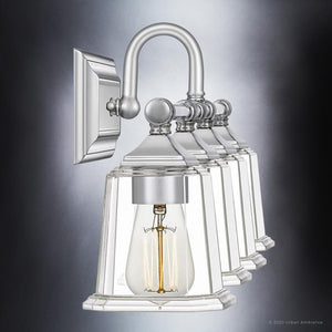 A beautiful UQL4120 Traditional Bath Fixture 10''H x 30.5''W, Polished Chrome Finish Edinburgh Collection wall sconce with a clear glass bulb, providing luxury lighting