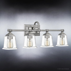 Four UQL4121 Traditional Bath Fixtures with clear glass shades, from the Edinburgh Collection by Urban Ambiance offering gorgeous design and luxury.