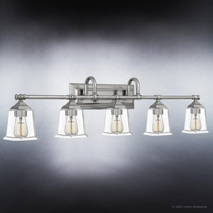 An UQL4123 Traditional Bath Fixture 10.75''H x 41.75''W, Brushed Nickel Finish, Edinburgh Collection by Urban Ambiance with clear glass shades is