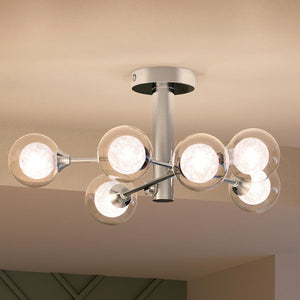 A unique and luxurious UQL4140 Modern Ceiling 10''H x 25.5''W, Polished Chrome Finish, Croydon Collection ceiling light with six glass globes.