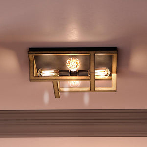 A unique lighting fixture, the UQL4180 Modern Farmhouse Ceiling 6''H x 16''W from Urban Ambiance's Grantham Collection features a textured gold finish.