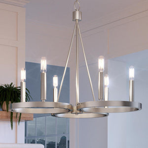 An Urban Ambiance UQL4220 Modern Chandelier hanging in a living room, creating a beautiful and luxurious ambiance.