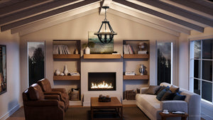 A living room with a luxury lighting fixture, the Urban Ambiance UQL4260 Modern Farmland Chandelier 17''H x 16''W, Natural Black Finish, Barry Collection.