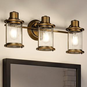 Three beautiful UQL4281 Vintage Bath Fixtures with a gorgeous rustic brass finish from Urban Ambiance's Wellington Collection.