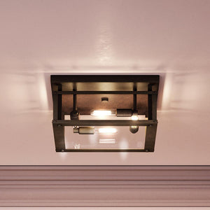 An Urban Ambiance ceiling light with a glass shade in a pink room, the UQL4370 Modern Farmhouse Ceiling 7''H x 12''W, Warm Bronze Finish, Wadebridge