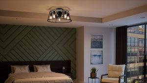 A UQL9000 Contemporary Ceiling Fan with a beautiful Ash Black Finish from the Bergen Collection by Urban Ambiance in a bedroom with a green wall.