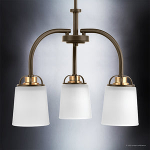 Elevate your space with the Urban Ambiance UHP2764 Transitional Chandelier from the Boise Collection, featuring three gracefully curved bronze metal arms and frosted, prismatic glass shades. Measuring 16-1/8″ x 20″ with an elegant Olde Bronze finish, this sophisticated light fixture stands out beautifully against a gray gradient backdrop.