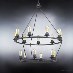 Suspended against a gradient gray background, the Urban Ambiance UHP2247 XL Industrial Chandelier from the Nashville Collection features a sophisticated charcoal finish. This striking two-tiered black metal fixture measures 41-5/8″ x 36″ and displays twelve exposed Edison-style light bulbs for an eye-catching industrial look.