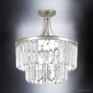 A beautiful UHP2468 Cosmopolitan Chandelier lighting fixture with a clear glass shade by Urban Ambiance.