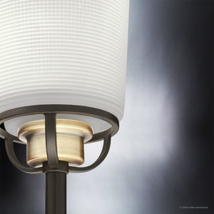 Close-up of the Urban Ambiance UHP2768 Transitional Chandelier from the Boise Collection, featuring a white textured glass shade, brushed metal accents in an Olde Bronze finish, and a black support—all set against a gray gradient background. The chandelier measures 20-3/8″ x 31-1/4″.