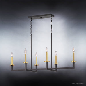 The Urban Ambiance Cordoba Collection UHP2803 Modern Farmhouse Chandelier features a rectangular silhouette finished in charcoal, suspended from the ceiling by dual chains. Six candle-style bulbs complement its striking two-tone geometric design, showcased against a gradient background.