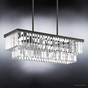 A unique Urban Ambiance UHP2882 Cosmopolitan Farmhouse Crystal Chandelier, boasting luxury, hangs on a dark background.