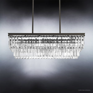 A unique and luxurious lighting fixture, the UHP2882 Cosmopolitan Farmhouse Crystal Chandelier from the Lille Collection by Urban Ambiance hangs beautifully on a dark background.