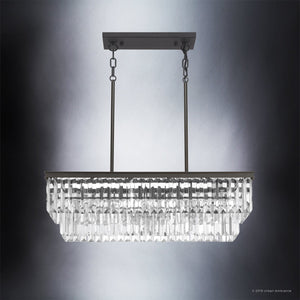 A unique lighting fixture, the UHP2882 Cosmopolitan Farmhouse Crystal Chandelier from Urban Ambiance features a black metal frame and an Olde Bronze Finish.