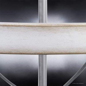 Close-up of the backrest and frame of a white, distressed wooden chair with a metallic support bar, set against a gradient gray background—perfect for complementing spaces illuminated by the Urban Ambiance UHP2902 XL Farmhouse Chandelier from the Adelaide Collection, featuring a 40-1/2″ x 35″ open cage design in a galvanized steel finish.