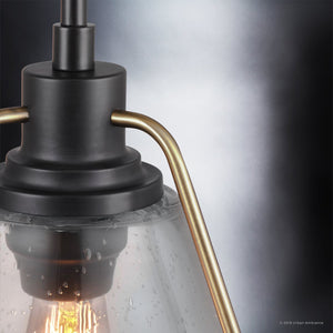 Close-up of the Urban Ambiance UHP2991 Industrial Pendant Light from the Rochdale Collection, measuring 13″ x 13″ and showcasing an Olde Bronze finish with a clear seeded glass shade accented by water droplets.